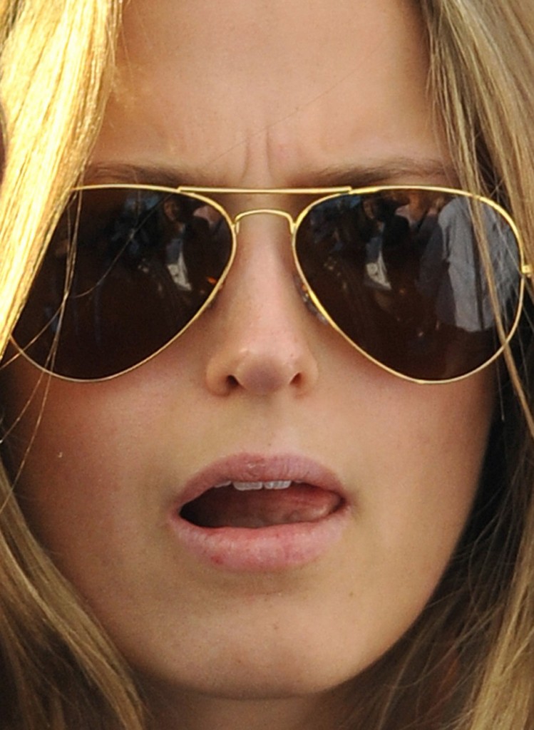 Kim Sears, Andy Murray's girlfriend, licking lips