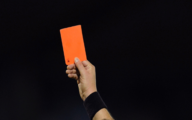 A close up image of a red card