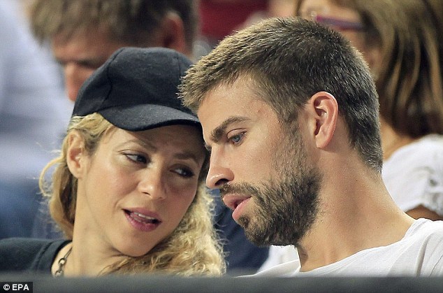 Shakira and Gerard Pique at a basketball game in Barcelona