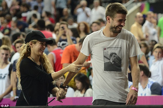 Shakira and Gerard Pique at a basketball game in Barcelona