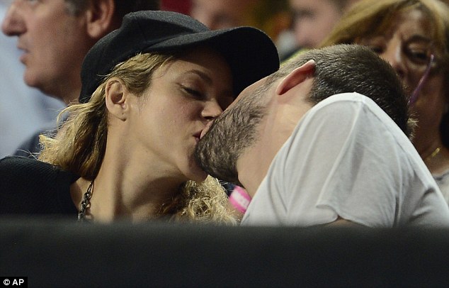 Shakira and Gerard Pique at a basketball game in Barcelona