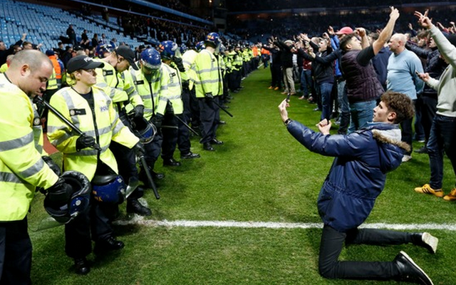 Loser Aston Villa fan during pitch invasion