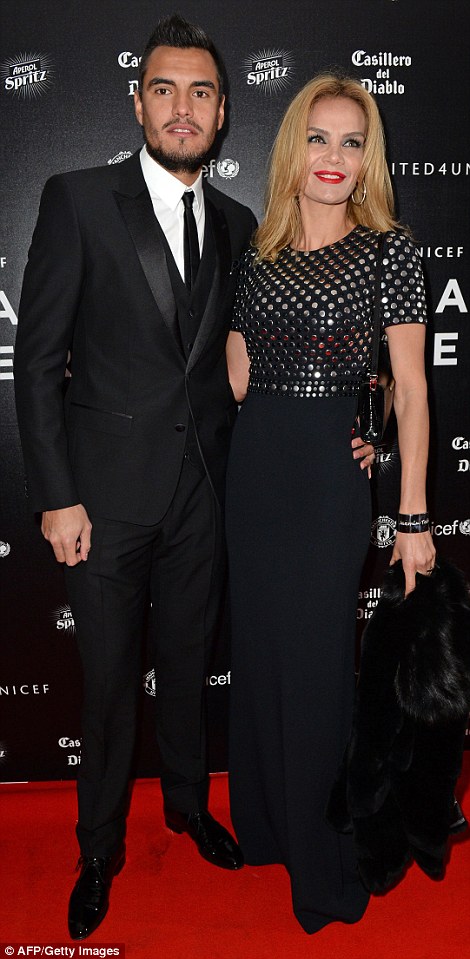 Sergio Romero and his wife Eliana Guercio