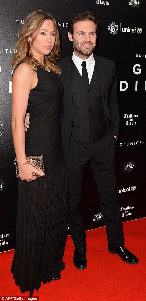 Juan Mata arrives with partner Evelina Kamph