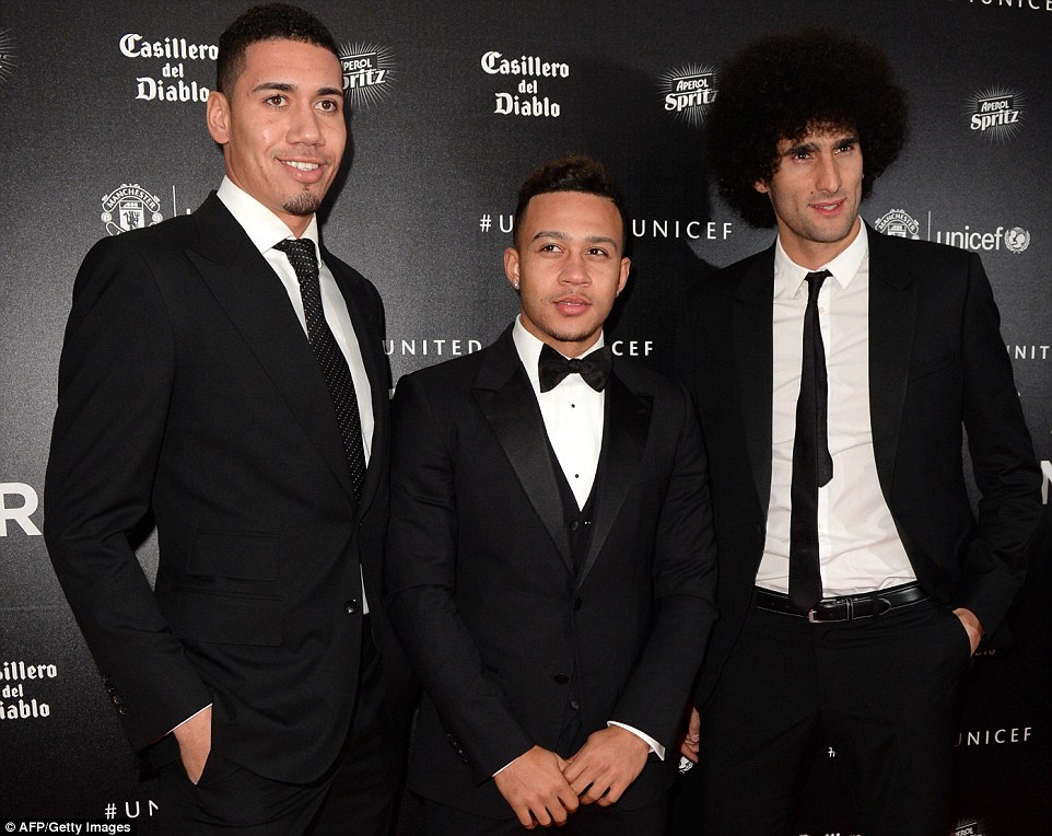 Chris Smalling, Memphis Depay and Marouane Fellaini