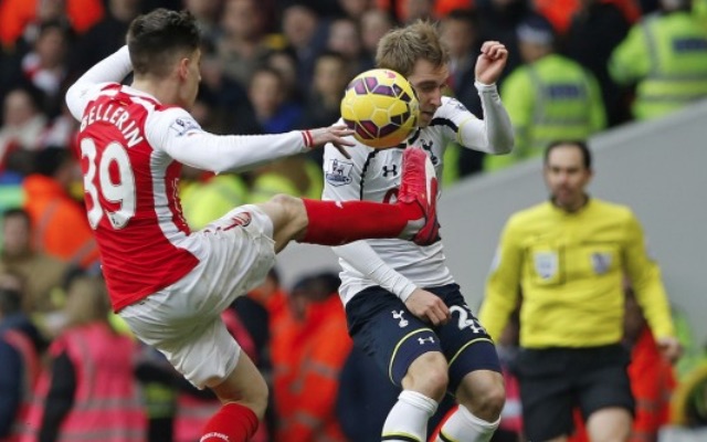 Hector Bellerin looks like he is kicking Christian Eriksen in the face