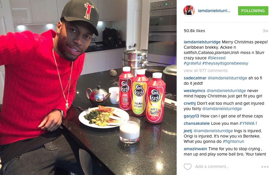 Daniel Sturridge eating Xmas dinner in a hat