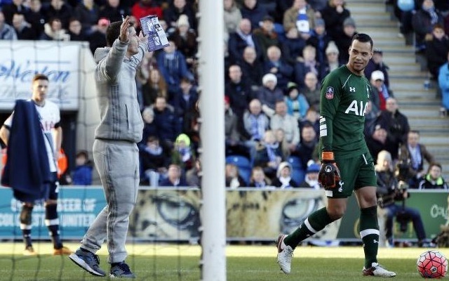 Michel Vorm and pitch invader