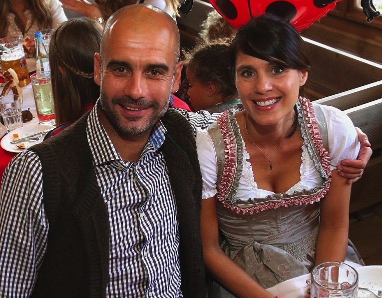 Pep Guardiola hugs wife Cristina Serra