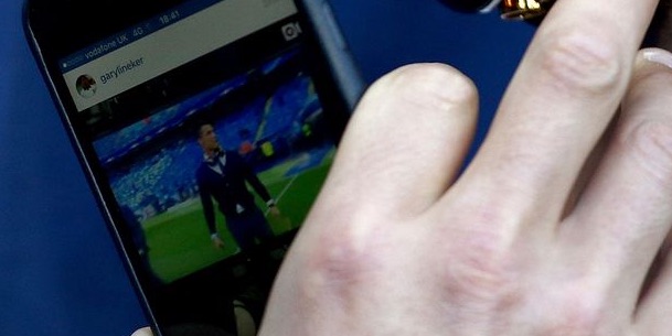 Cristiano Ronaldo ignores Man City v Real Madrid to look at Cristiano Ronaldo on Instagram (close up)