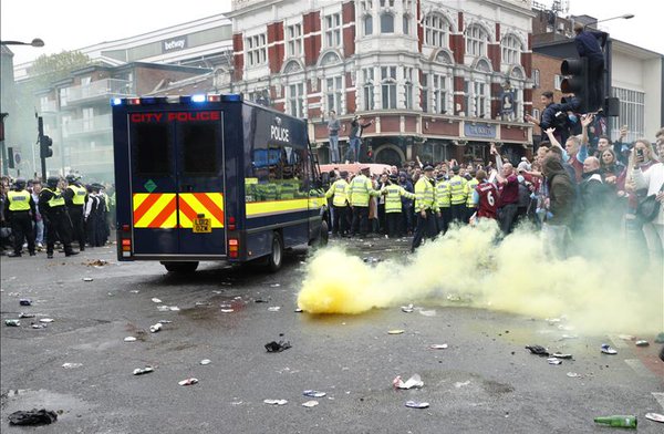 Police v fans West Ham Man United