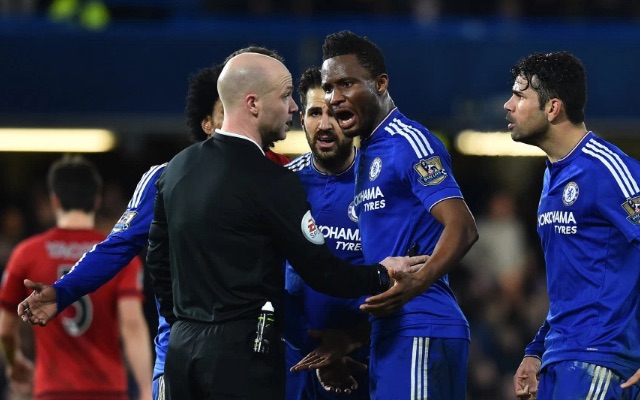 Chelsea players surround ref