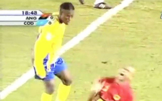 Tresor Mputu kicks Kali in the testicles