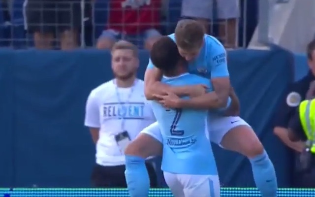 John Stones hugs Kyle Walker after scoring for Man City vs Tottenham Hotspur