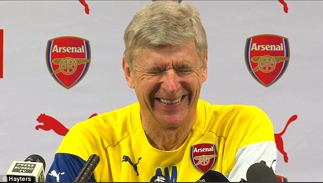 Wenger laughing