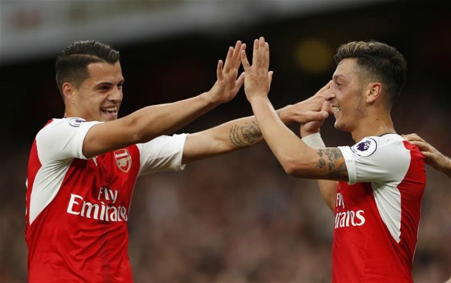 Granit Xhaka and Mesut Ozil
