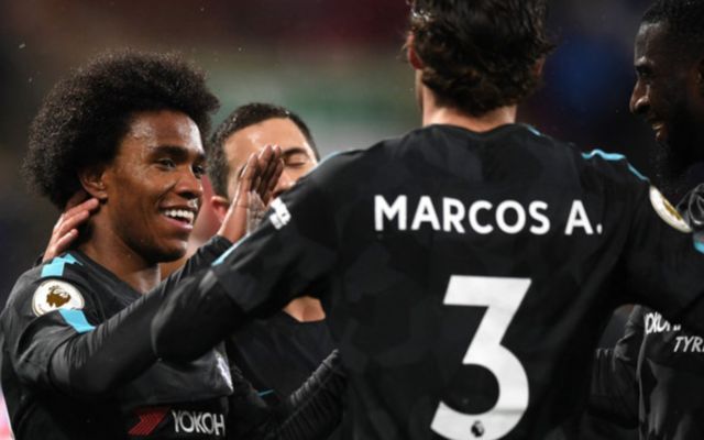 Willain celebrating with Chelsea teammates