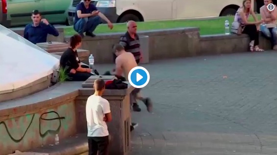 Topless hooligan knocked out with one punch after picking on Liverpool fans