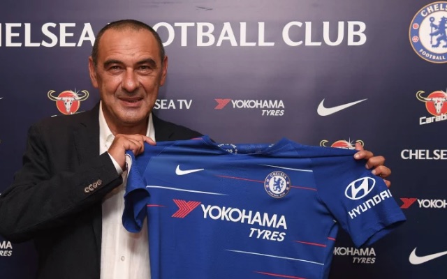 Maurizio Sarri poses with Chelsea shirt