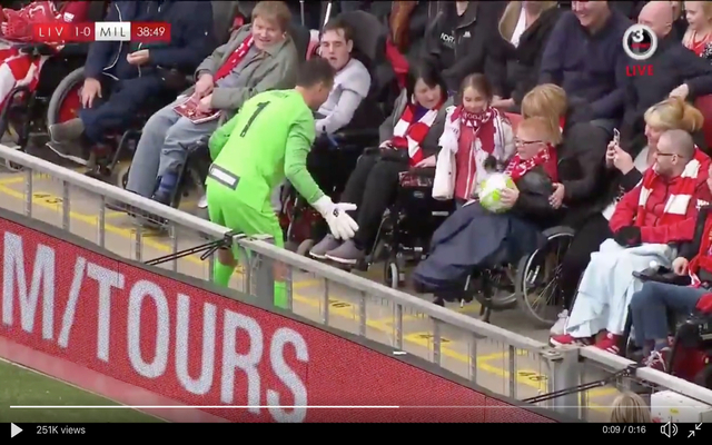 Jerzy-Dudek-shows-his-class-by-stopping-match-to-play-with-disabled-fan
