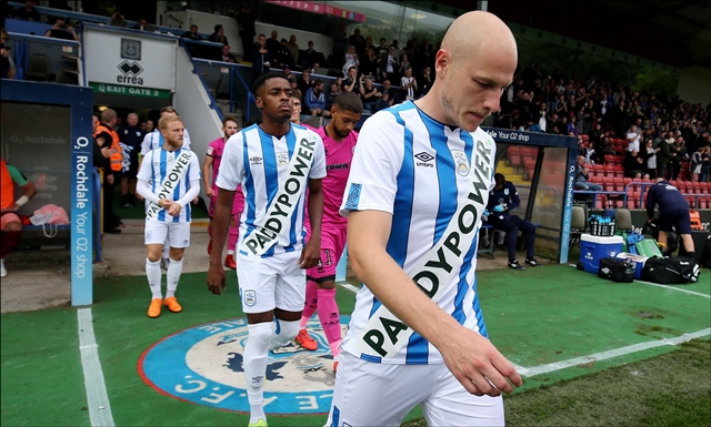 Huddersfield Town wear their 'fake' home shirt for the 2019/2020 in pre-season