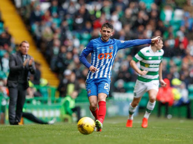 Greg Taylor in action against Celtic