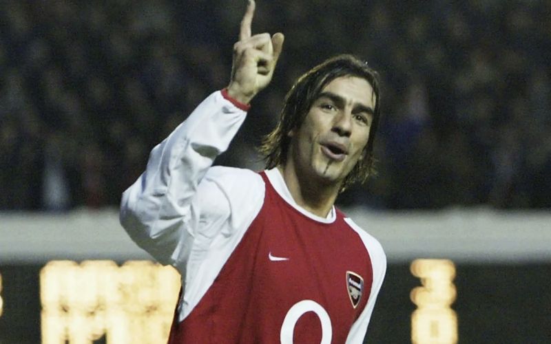 Robert Pires celebrates during an Arsenal match