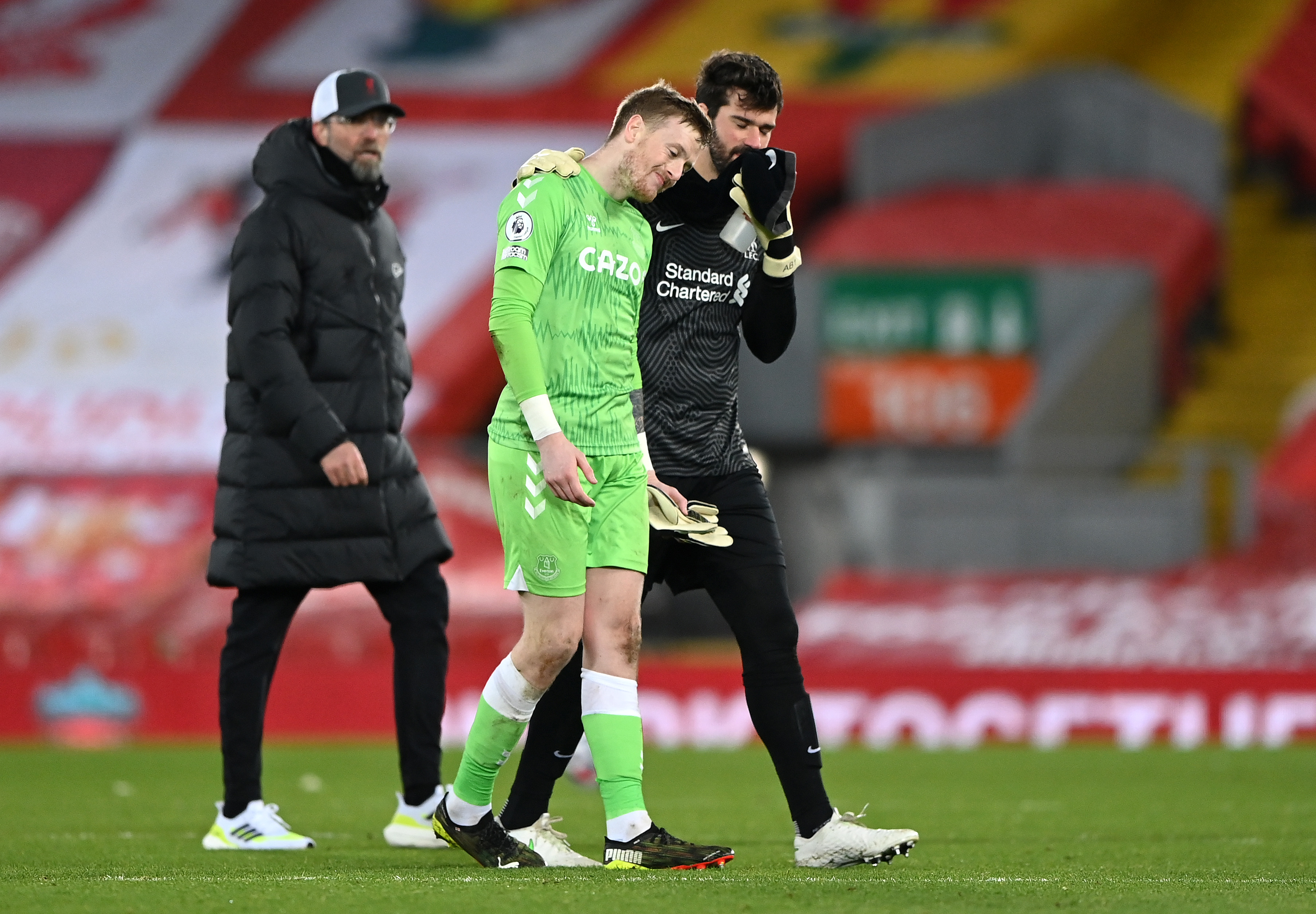 Alisson chills with Pickford after Everton beat Liverpool, Klopp angry in background