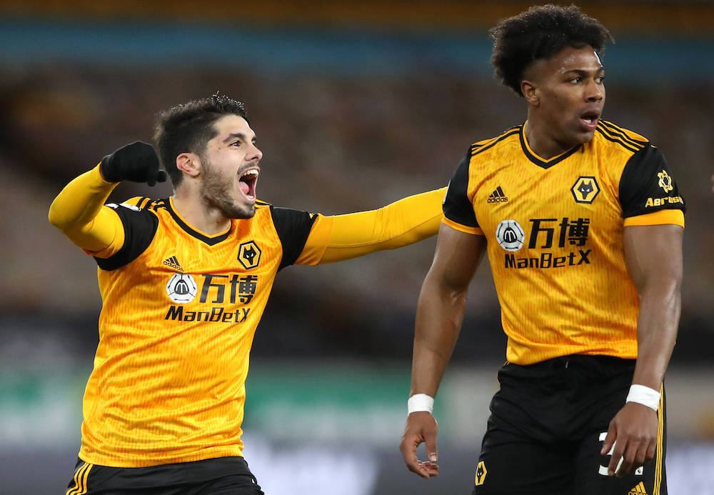 Wolverhampton Wanderers v Leeds United - Premier League - Molineux Stadium Wolverhampton Wanderers Pedro Neto and Adama