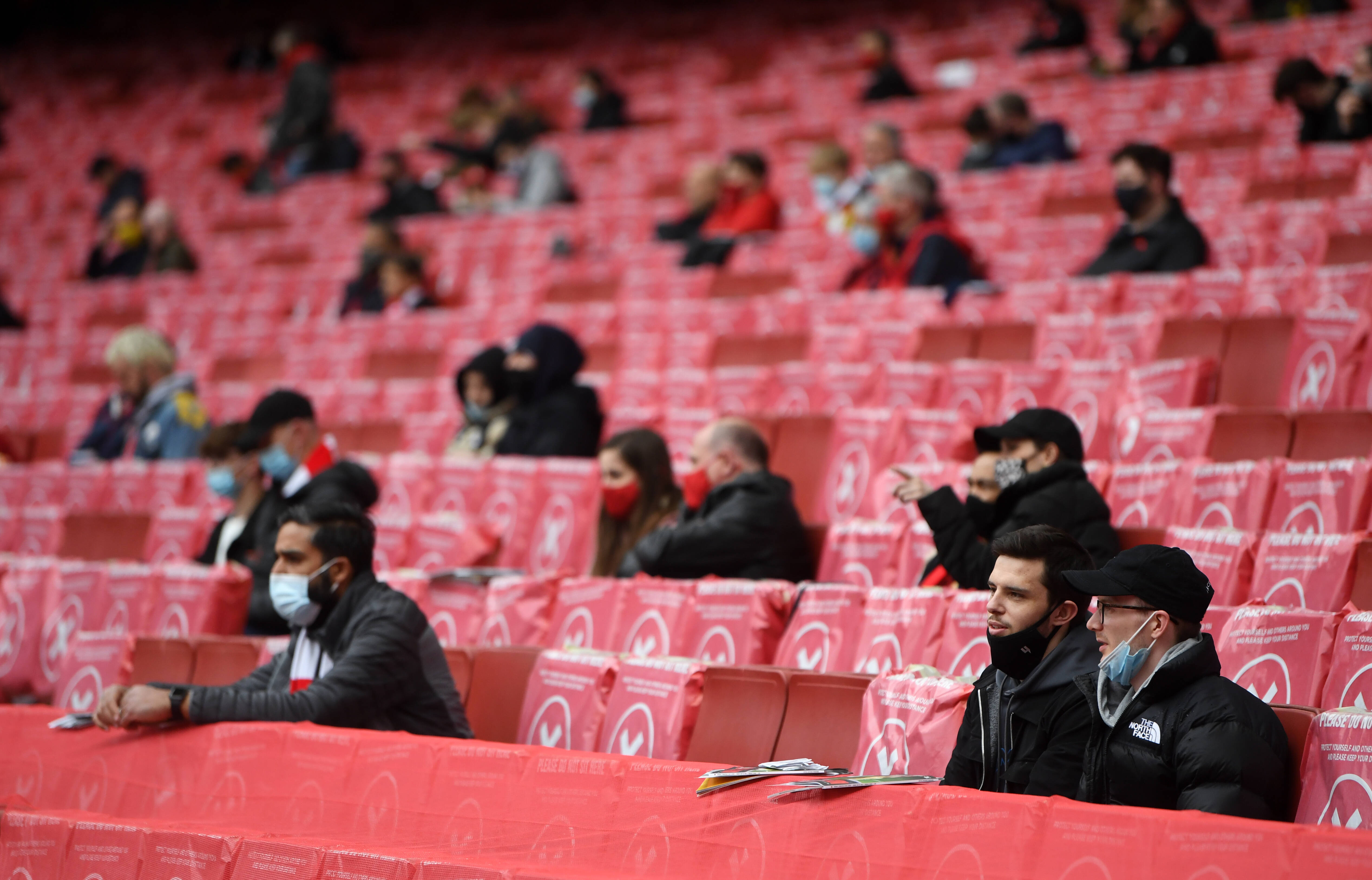 Arsenal fans watch on as fans return to the Emirates, 2020/21