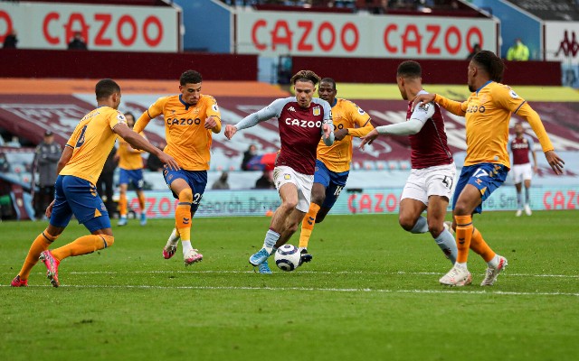 Grealish surrounded by Everton players