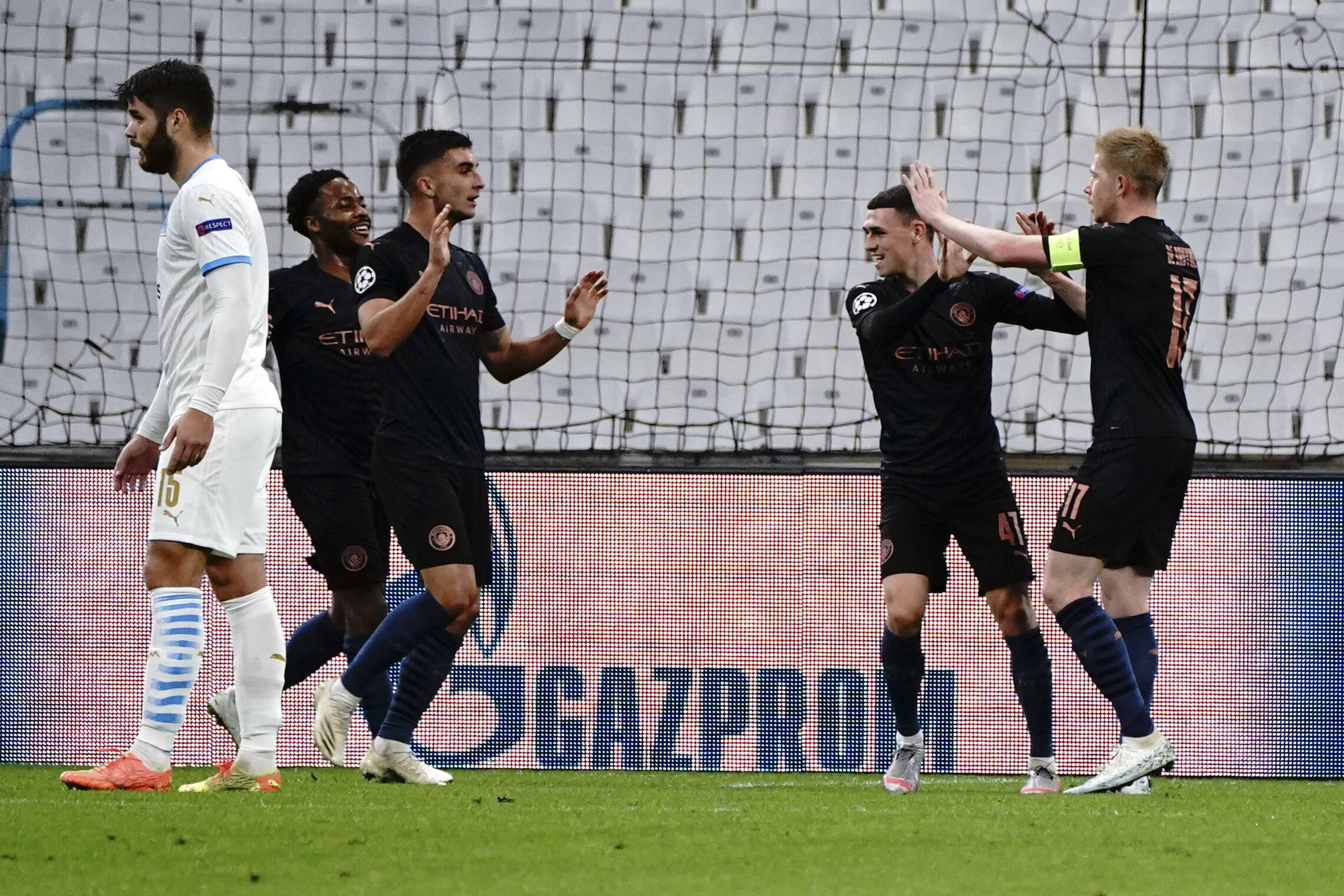 Sterling, Torres, Foden and De Bruyne celebrate for Man City