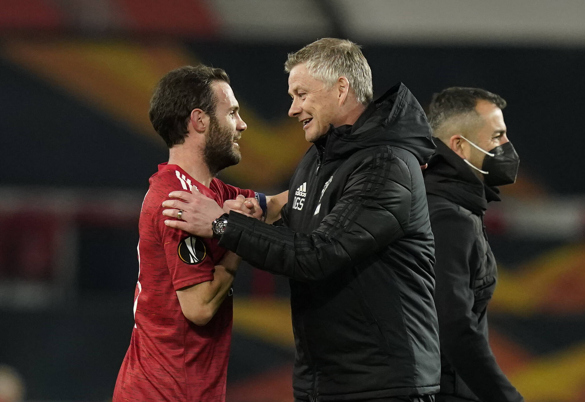Ole Gunnar Solskjaer hugs Juan Mata for Man United
