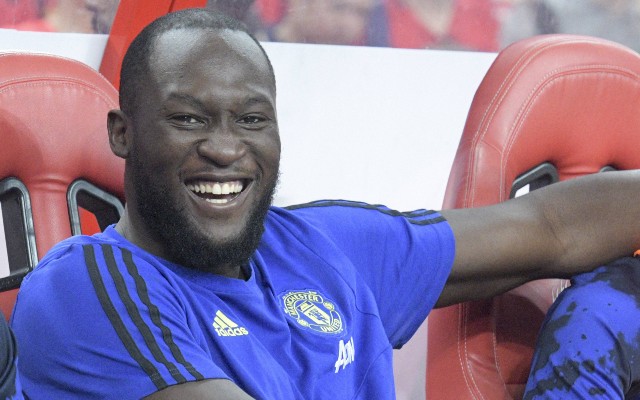 romelu lukaku laughing on the bench