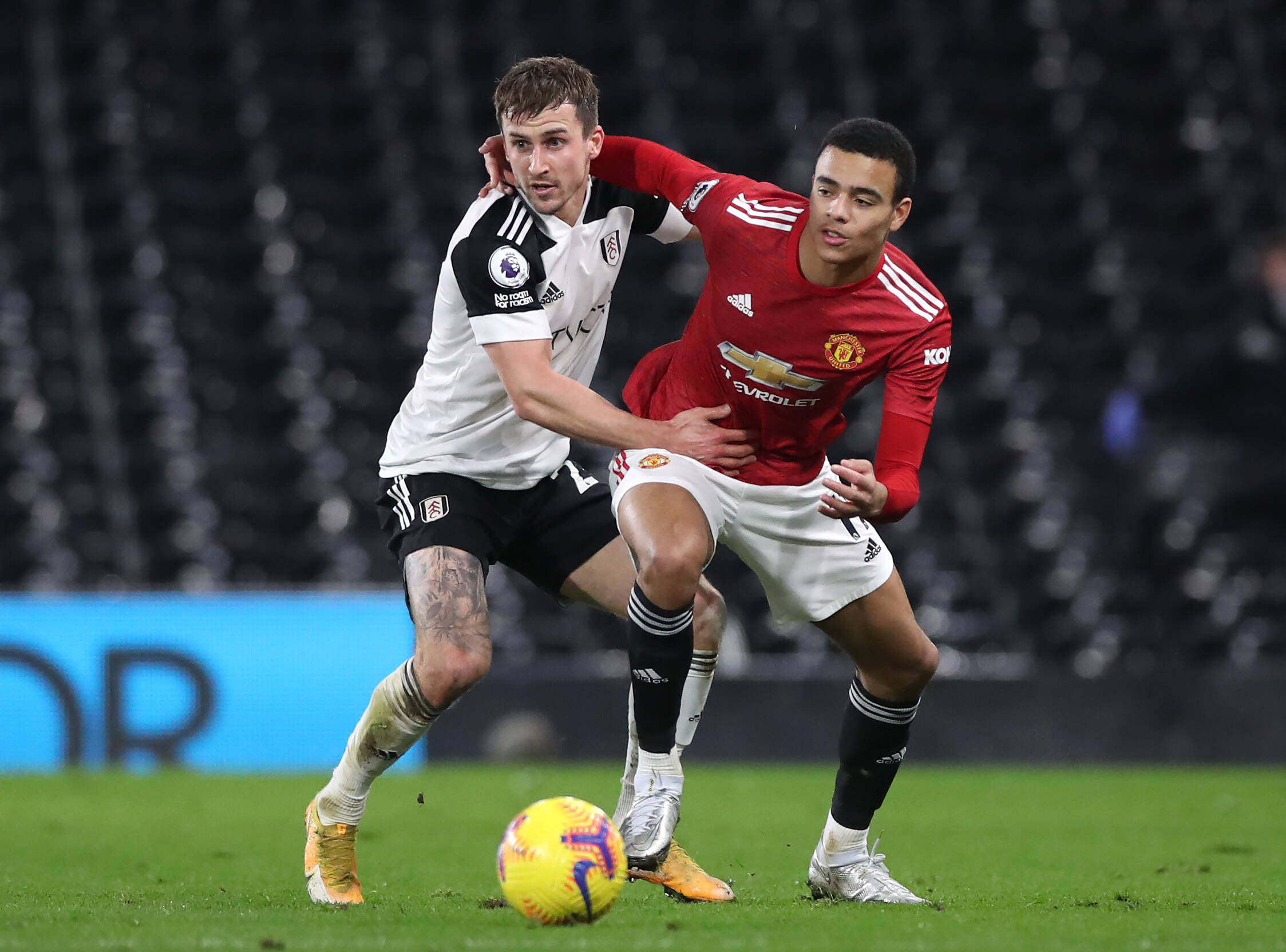 Joe Bryan marking Mason Greenwood