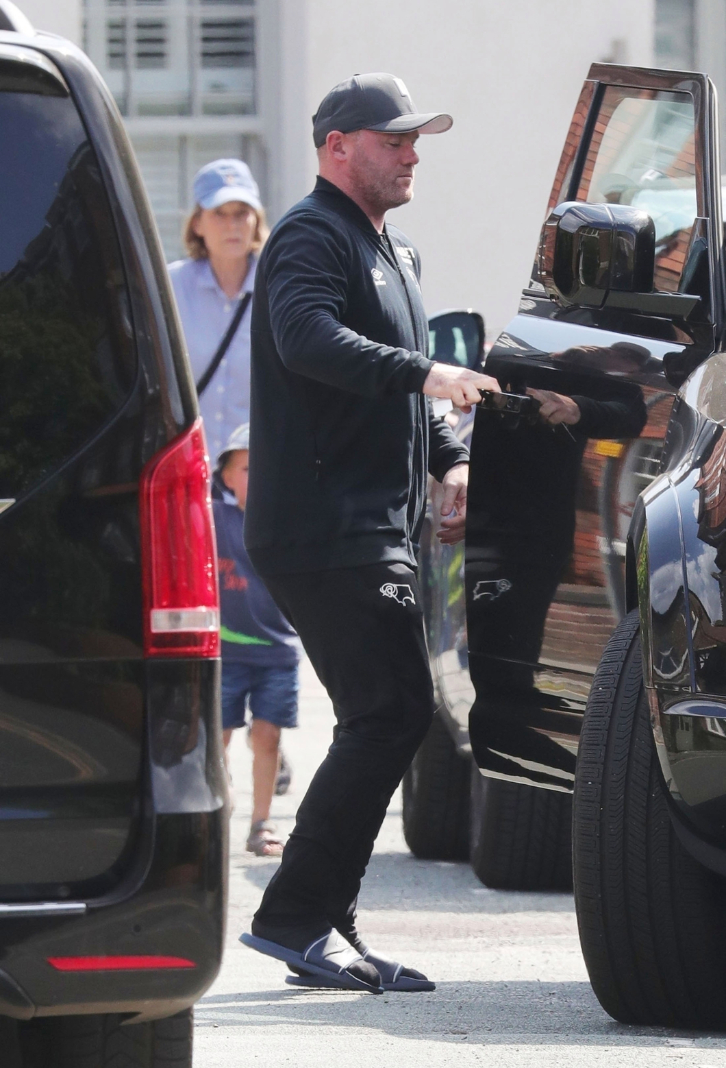 Wayne Rooney picks up car after wild hotel night with three girls 2