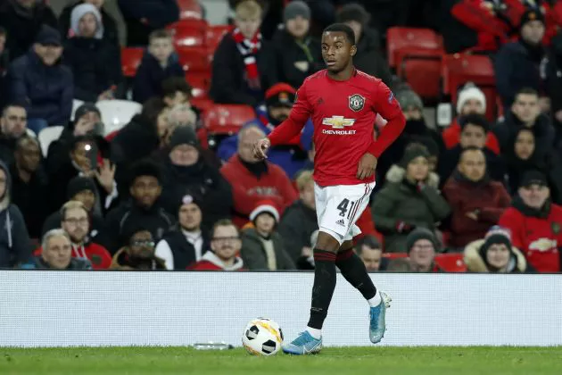 Ethan Laird in action for Manchester United