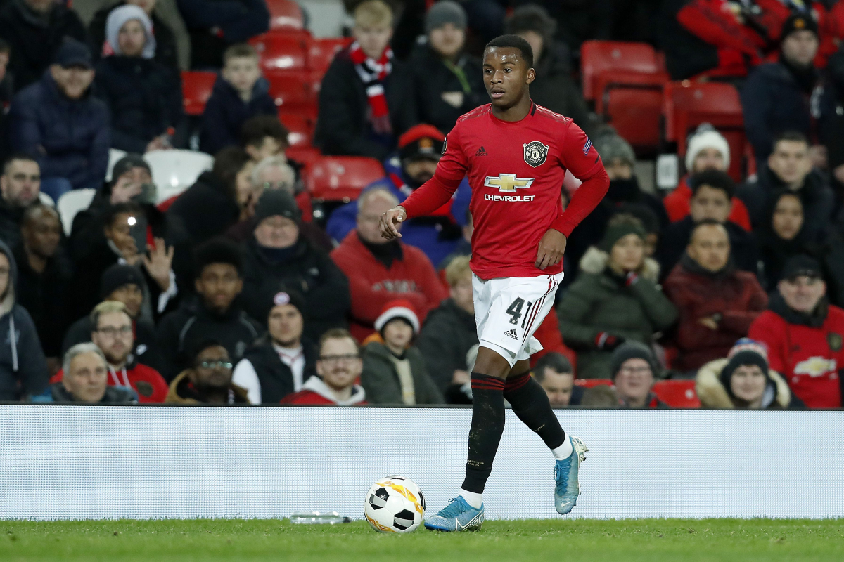 Ethan Laird in action for Manchester United