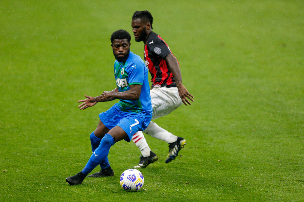 Jeremie Boga dribbling around Franck Kessie for Sassuolo vs Milan