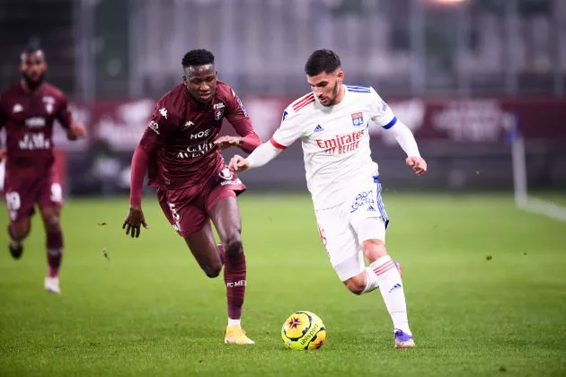 Pape Sarr of Metz battles Houssem Aouar