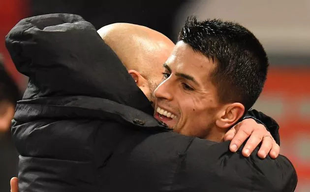Ferran Torres of Man City and Pep Guardiola