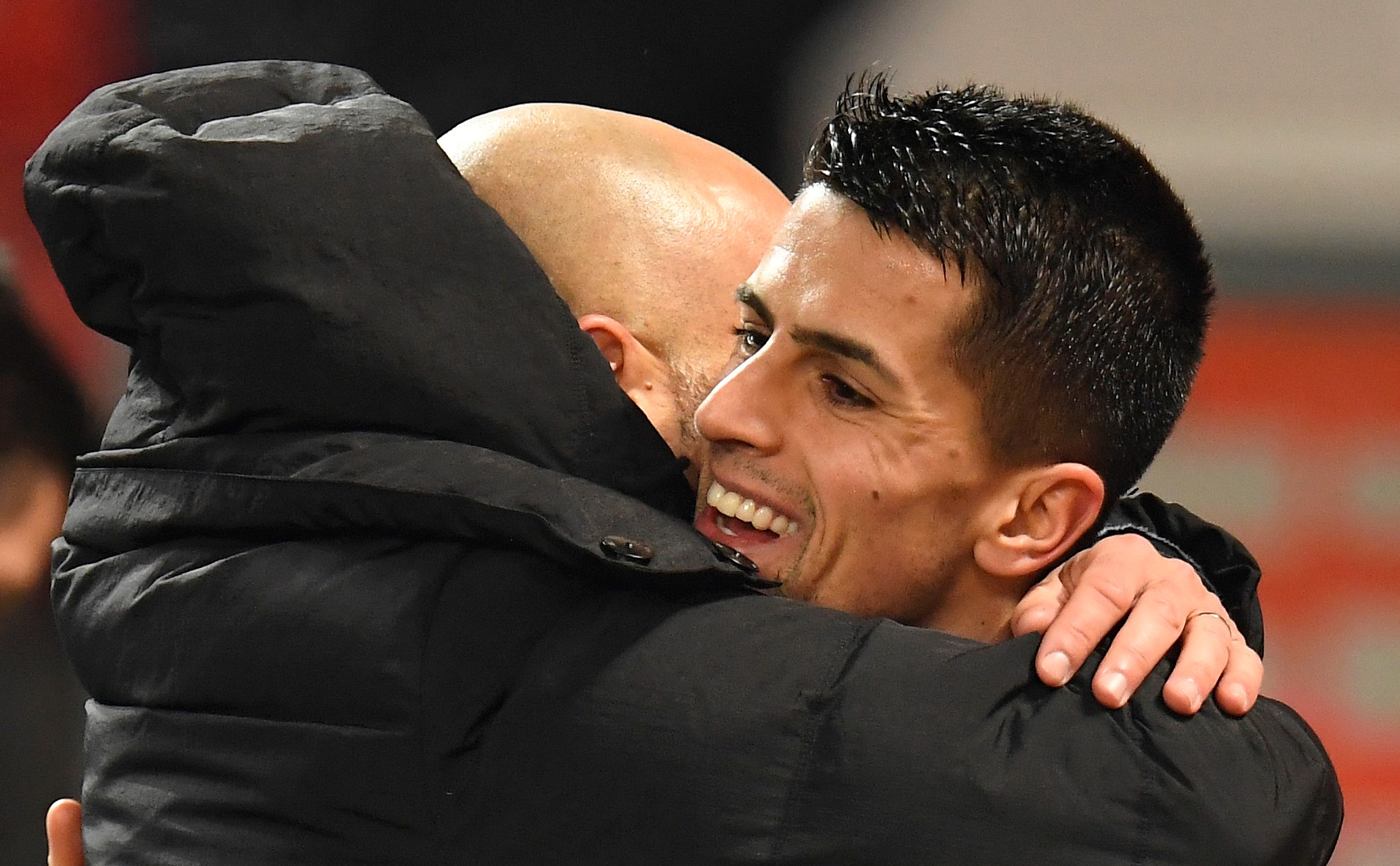 Ferran Torres of Man City and Pep Guardiola