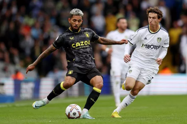 douglas luiz in action for aston villa vs leeds