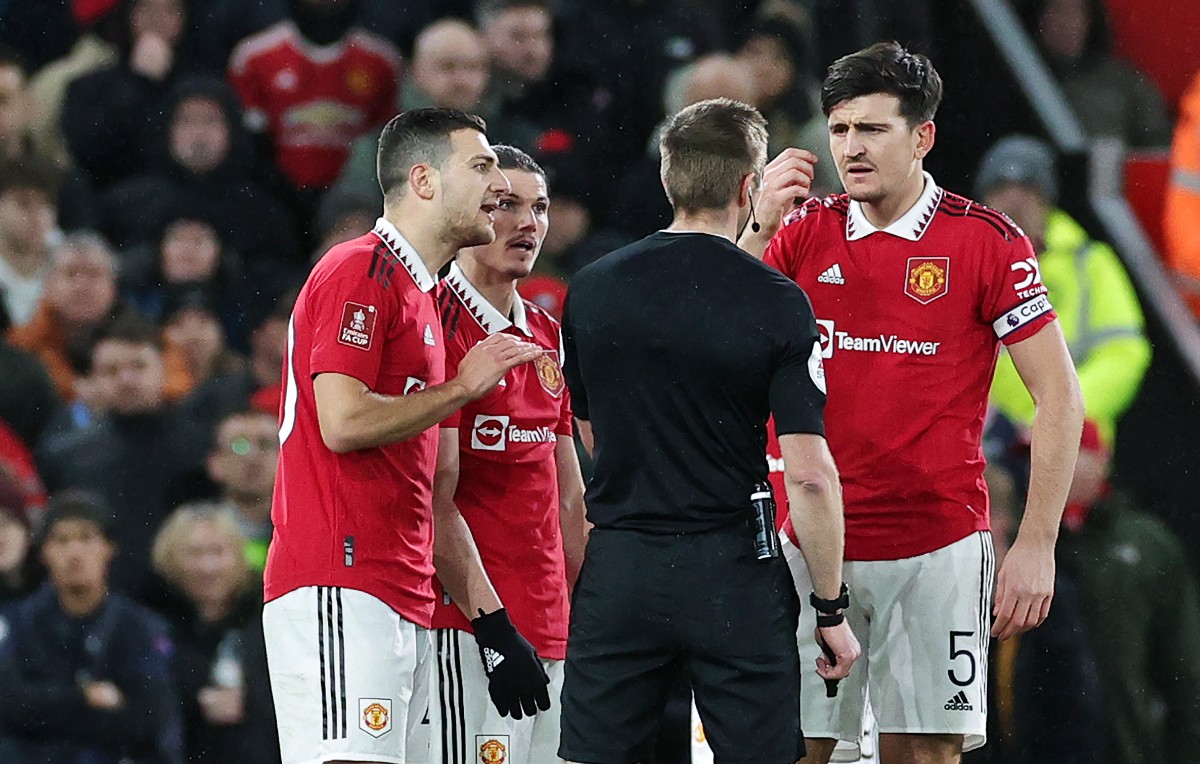 man united dalot maguire referee