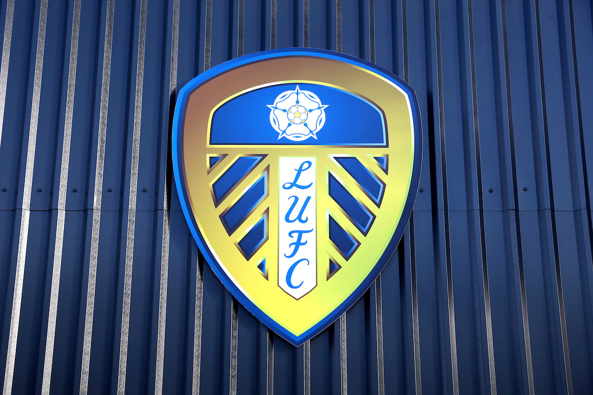 LEEDS, ENGLAND - DECEMBER 05: A general view of a Leeds United crest on a wall outside the stadium prior to the Premier League match between Leeds United and Brentford at Elland Road on December 05, 2021 in Leeds, England.