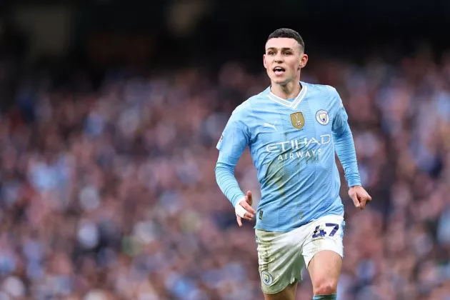 Phil Foden pictured playing for Man City