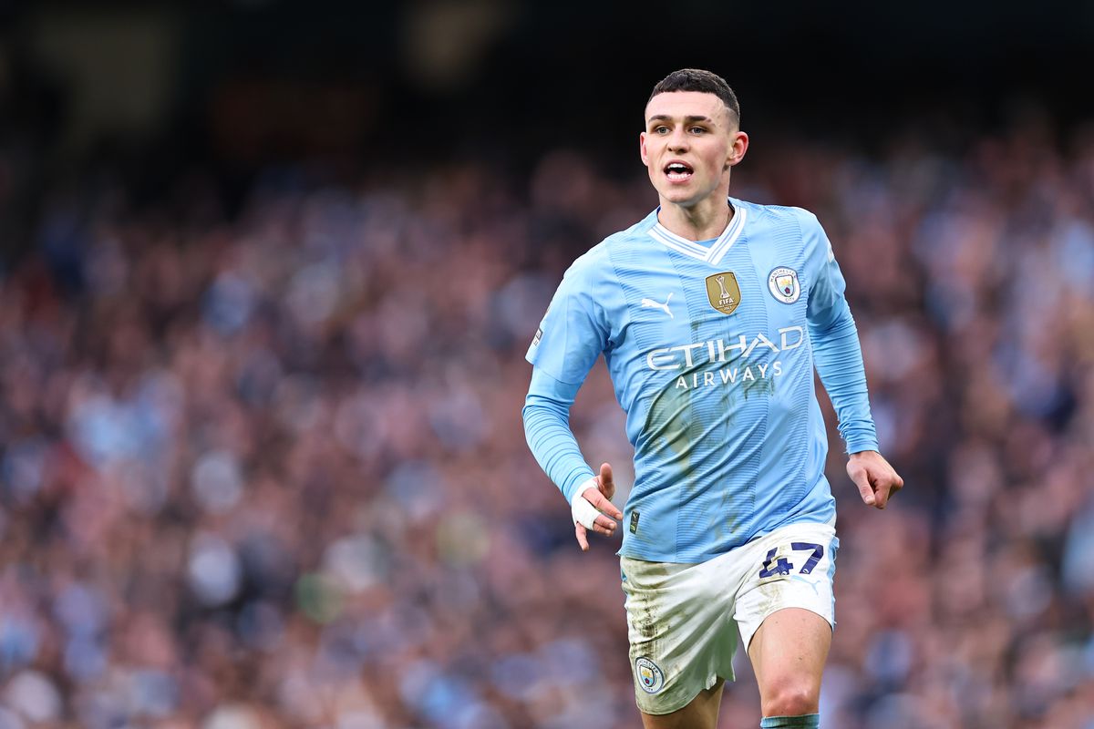 Phil Foden pictured playing for Man City