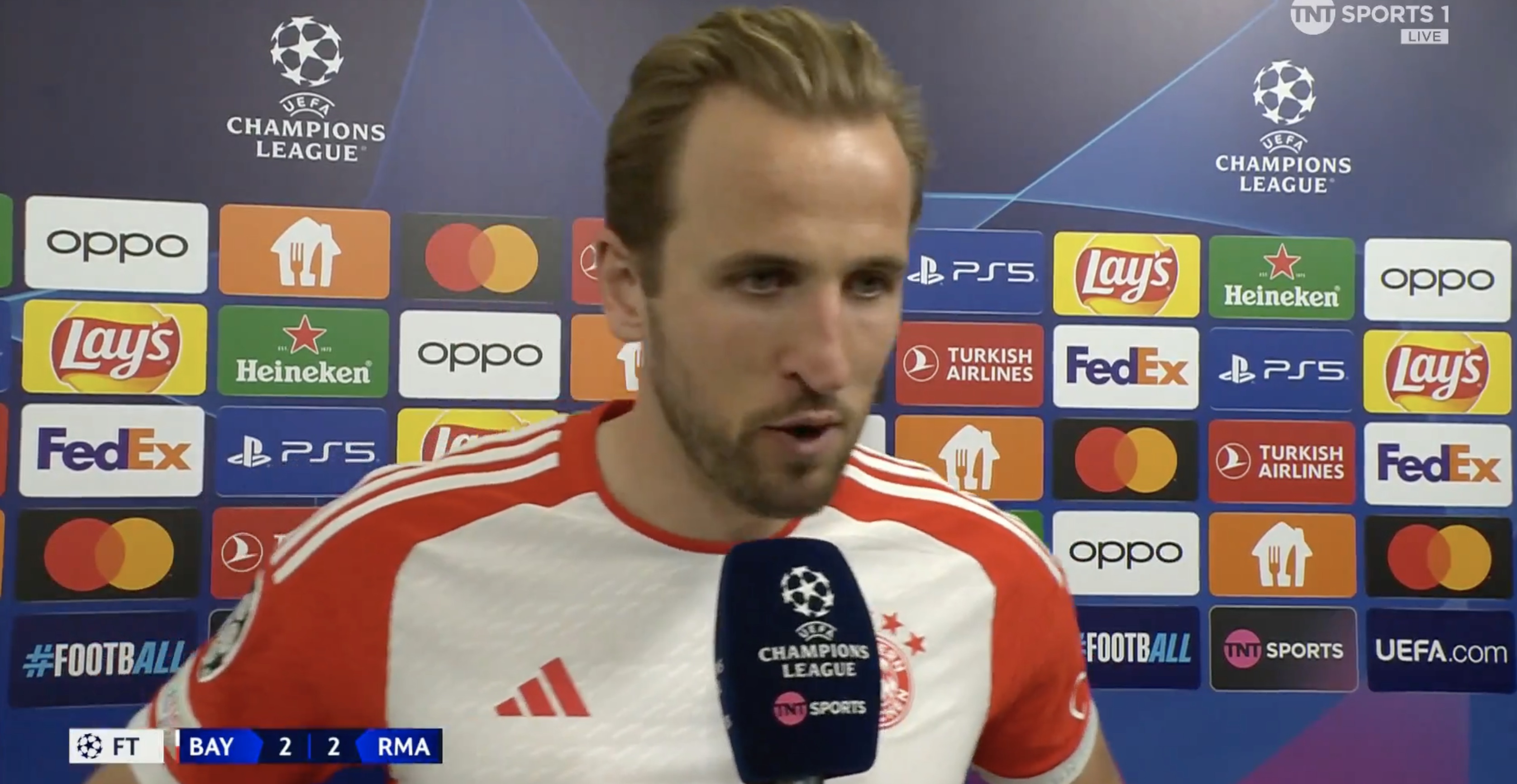 Harry Kane reacts to Real Madrid draw.