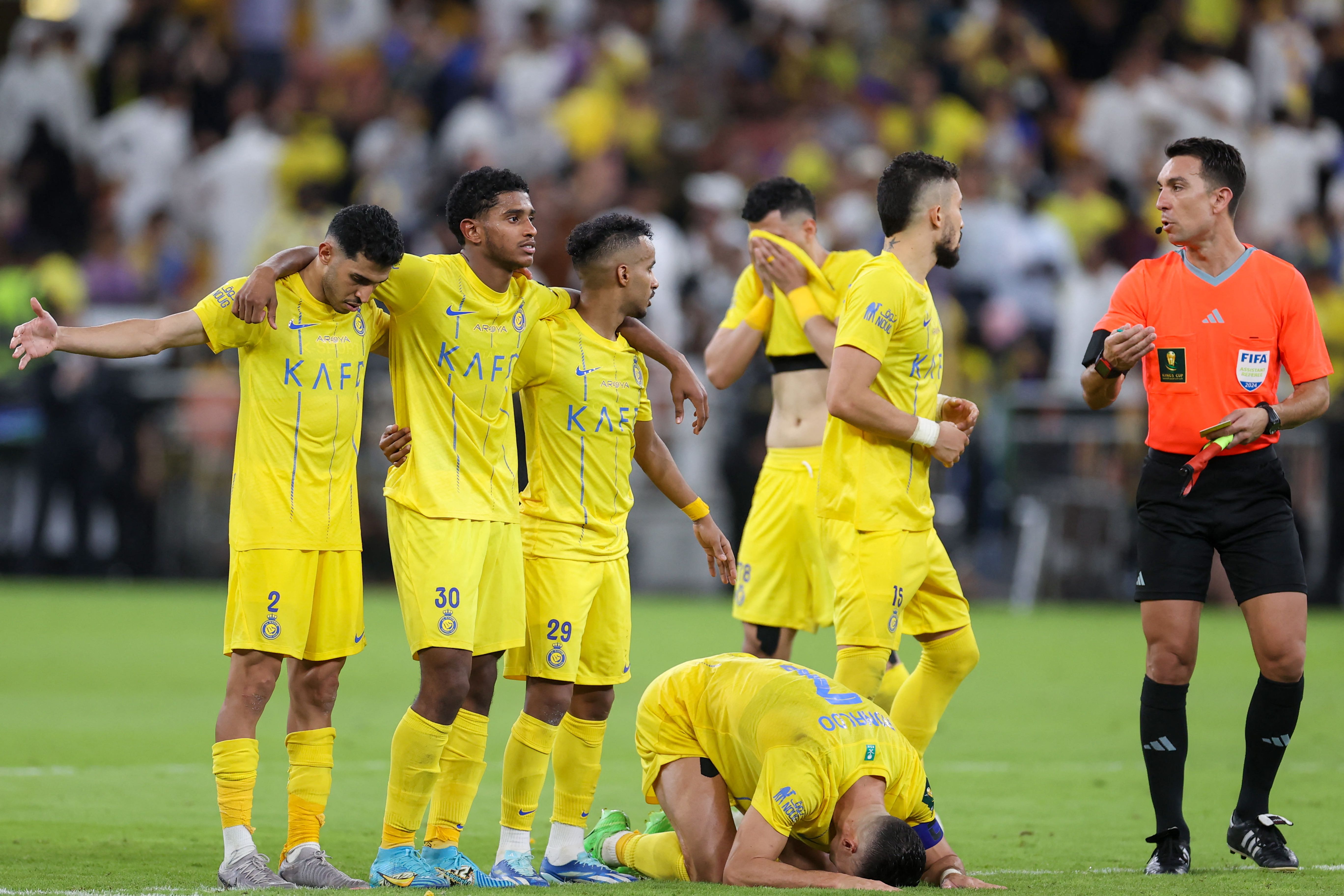 Al Nassr captain Cristiano Ronaldo pictured crying on the floor during his team's penalty shootout defeat by Al-Hilal in May 2024