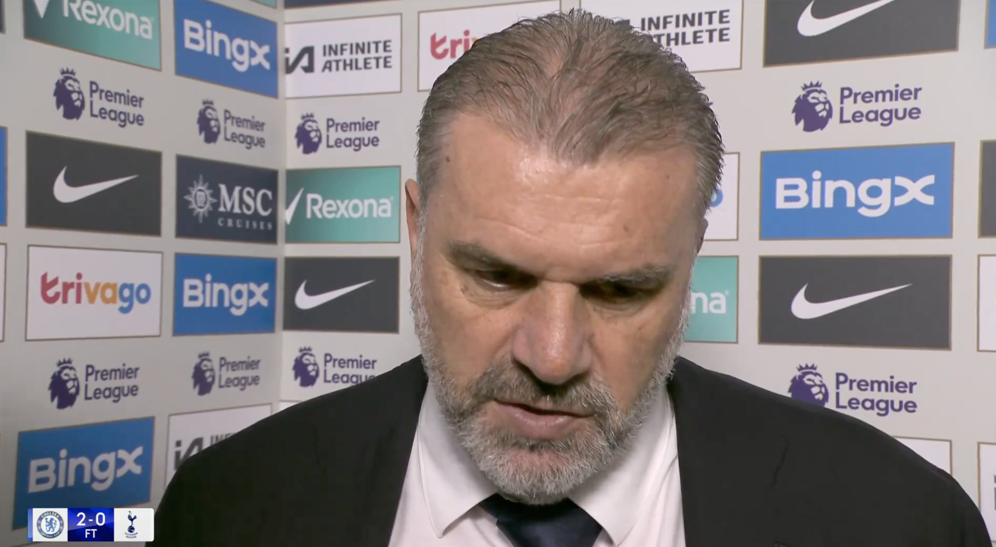 Ange Postecoglou reacts to Chelsea defeat.